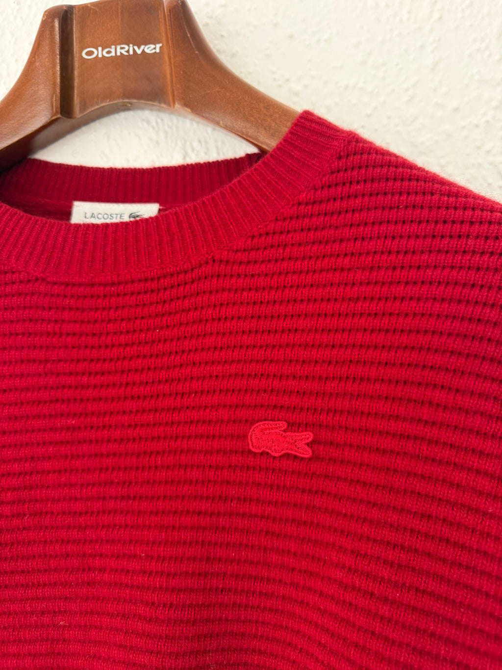 Pull rouge et bleu marine Lacoste taille XS