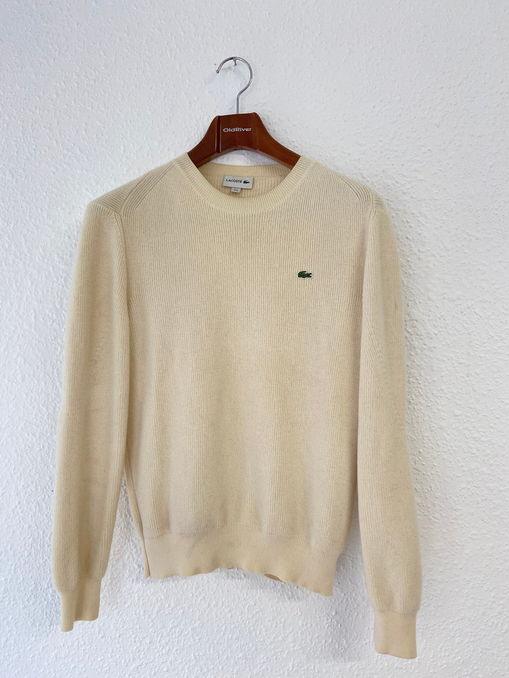 Pull beige Lacoste taille M col rond