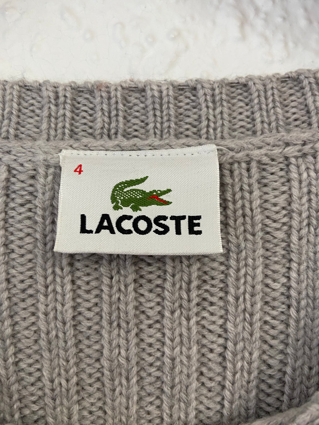 Pull gris Lacoste taille M