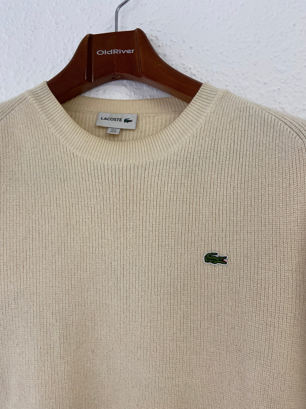 Pull beige Lacoste taille M col rond