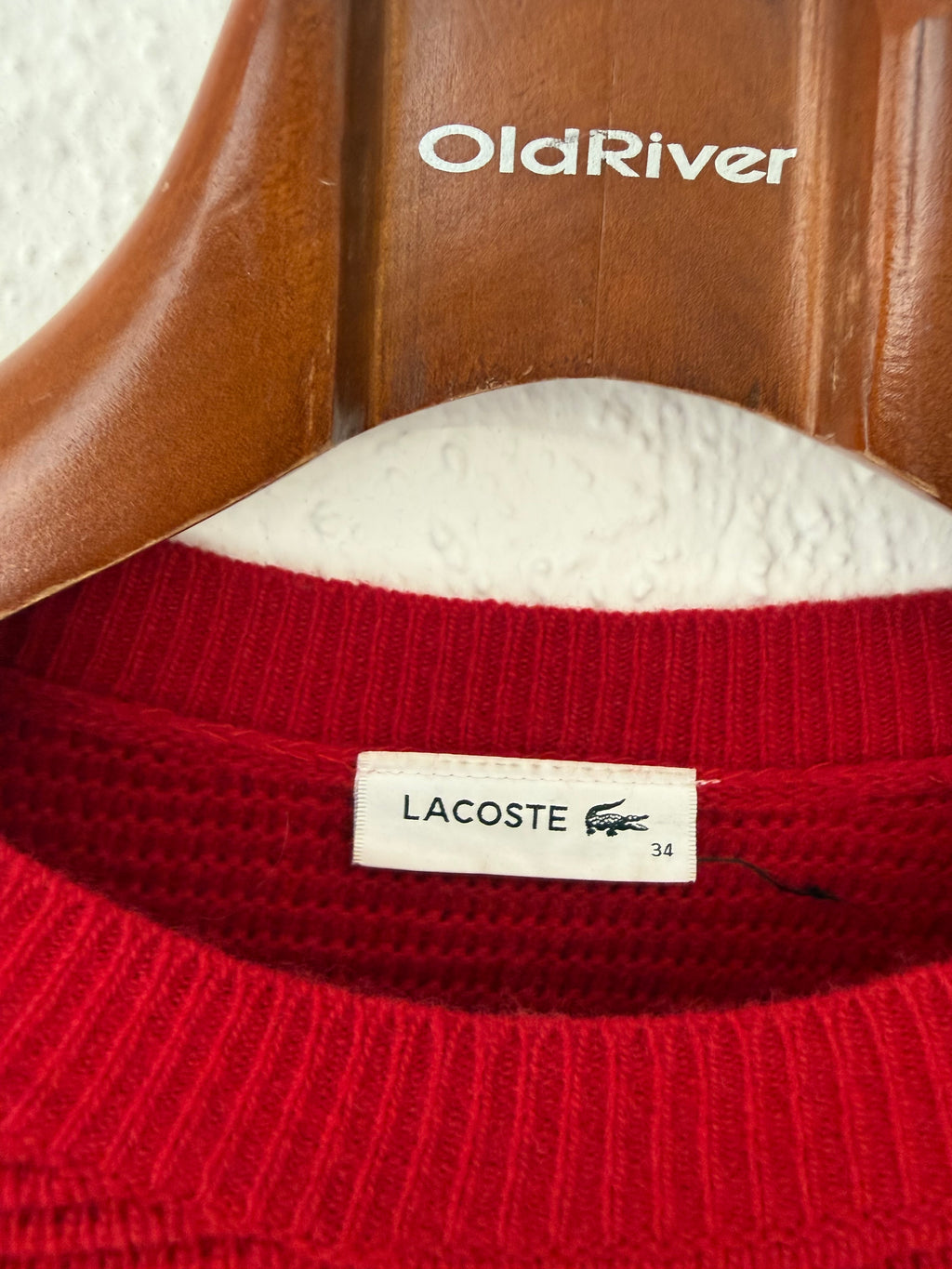Pull rouge et bleu marine Lacoste taille XS