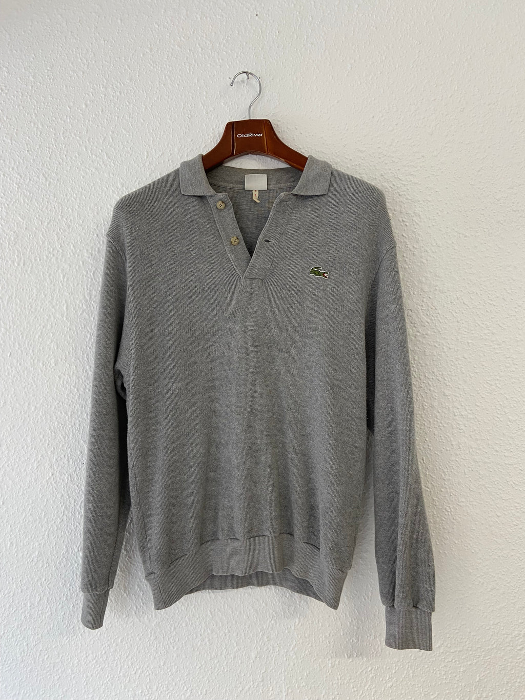 Pull gris Lacoste taille M